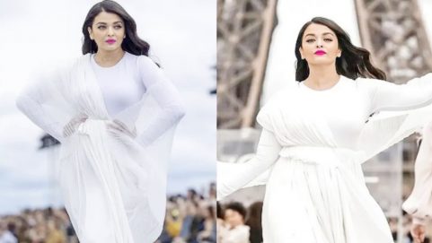 Aishwarya Rai is a vision in white as she walks the ramp at Paris Fashion Week, hand-in-hand with Helen Mirren