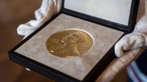 The medal to be presented to Nobel Laureate in Physics Roger Penrose by the Swedish ambassador to the UK Torbjorn Sohlstrom, is displayed before the ceremony at the ambassador's residence in London on December 8, 2020. - Adjusting to a world where travel is hampered by the pandemic, this year's Nobel laureates will receive their prizes at home this week following the cancellation of the traditional Stockholm and Oslo ceremonies. (Photo by Niklas HALLE'N / POOL / AFP)