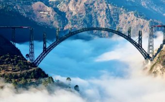 The worlds highest arch ChenabBridge over the clouds