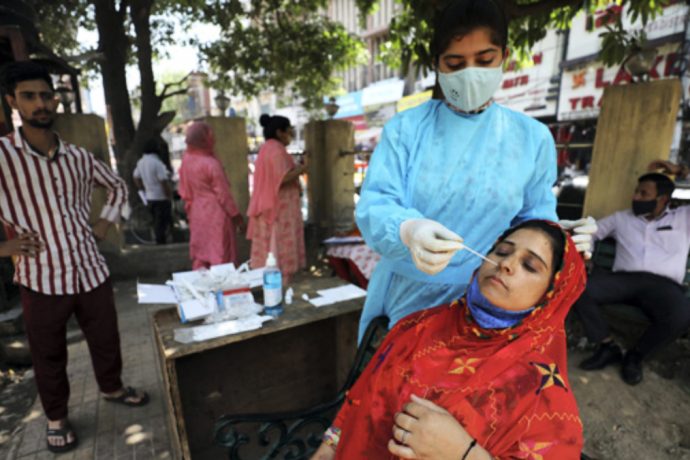 India sees dip in COVID cases, logs 2,338 fresh infections