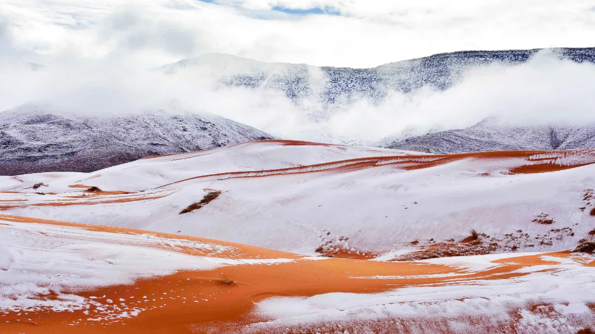 SNOW Falls In The SAHARA Ice Blankets The Dunes In Rare Desert Phenomenon After Temperatures Plummeted Overnight